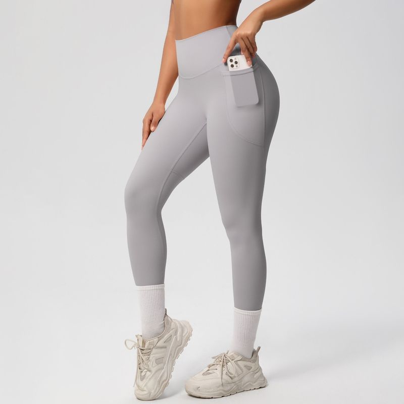 Fashion Nude Feel Beauty Back Cross Bubble Wrap Sports Bra High Waist Hip Lift Pocket Sports Yoga Pants Fitness Suit Women