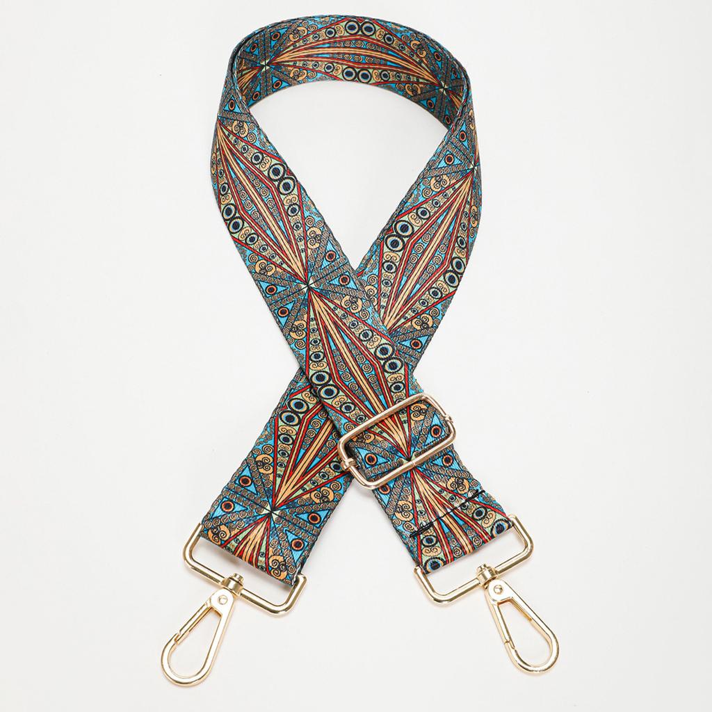 Bolso de hombro de lona con asas anchas y correa de hombro ajustable.
