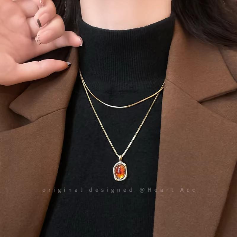 Elegant Stacked Pearl Necklace for Women - High-End Autumn/Winter Accessory with a Stylish Sweater Chain Design