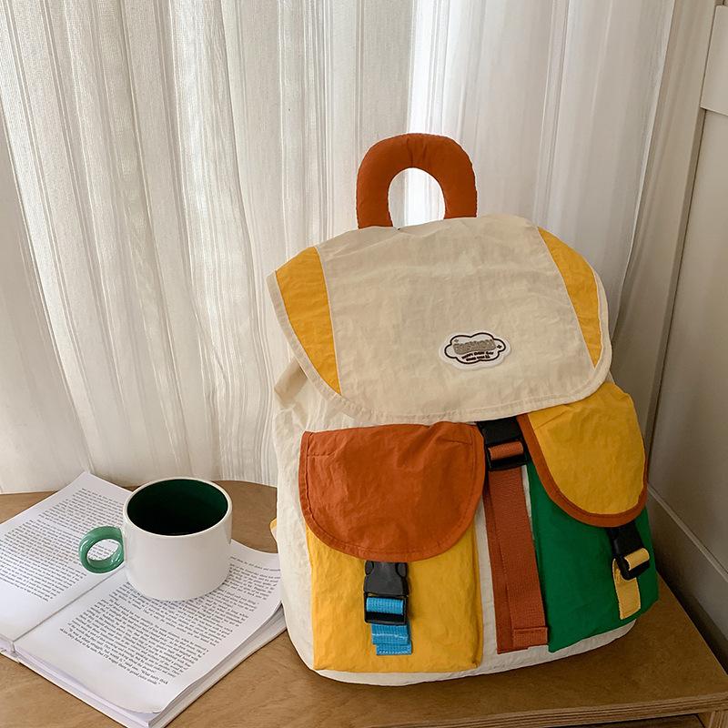 The new schoolbag is high-value, fresh and sweet, contrasting color splicing backpack, lightweight mountaineering travel backpack for men and women