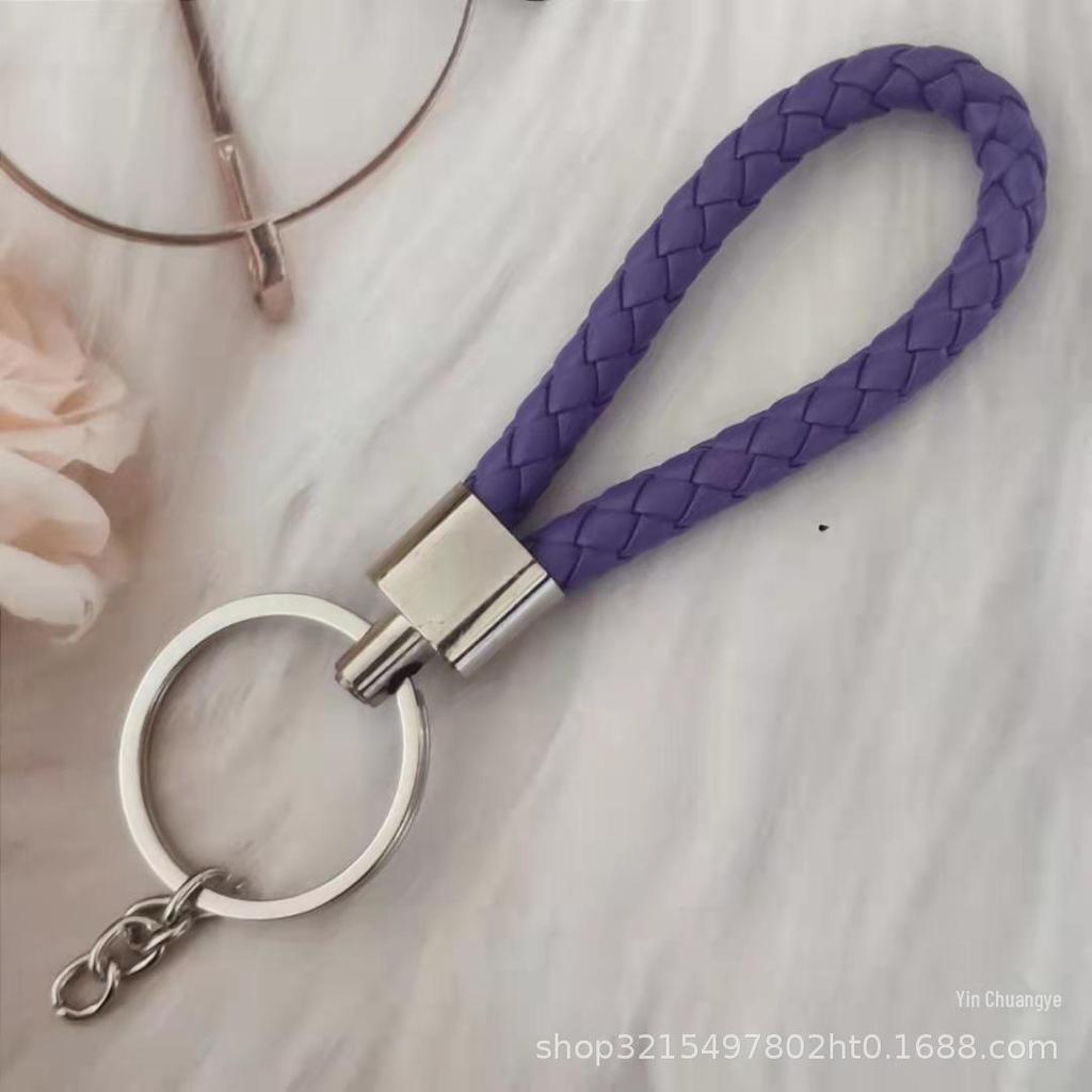 Gevlochten Lederen Touw Sleutelhanger met Poppenhanger - Modieus en Creatief Accessoire