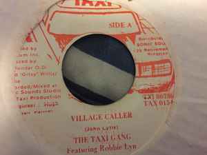 

7inch Record TAXI GANG ROBBIE LYN Village Caller TAX0154 Taxi Jamaica Reggae Ska Dub Used