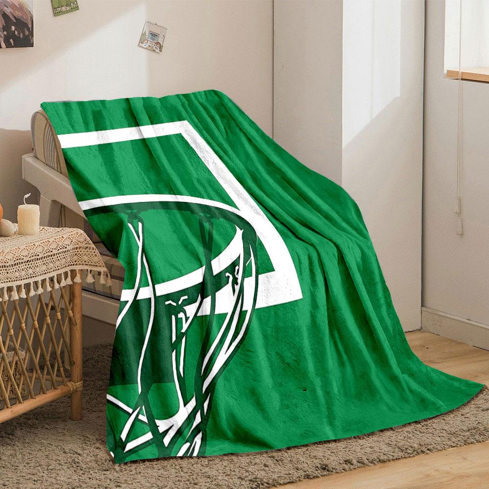 Basketball hoop and net silhouetted against a green background. for all seasons blanket lunch break throw gift
