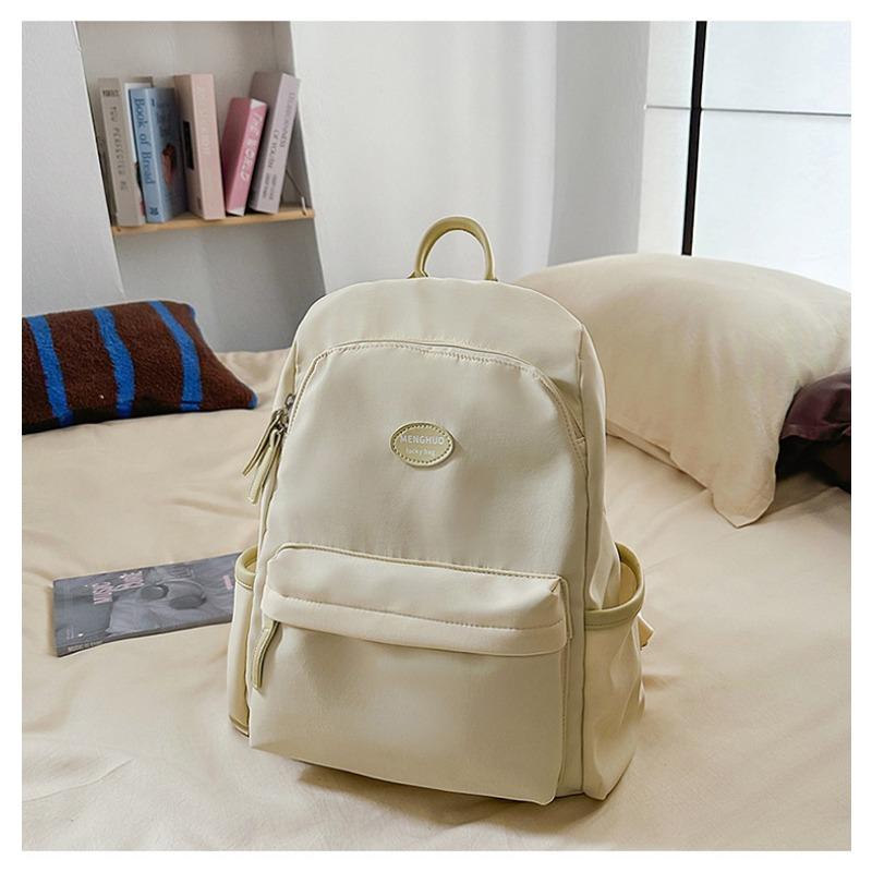 Fresh and sweet candy color backpack for junior high school students, solid color, simple and large-capacity backpack.