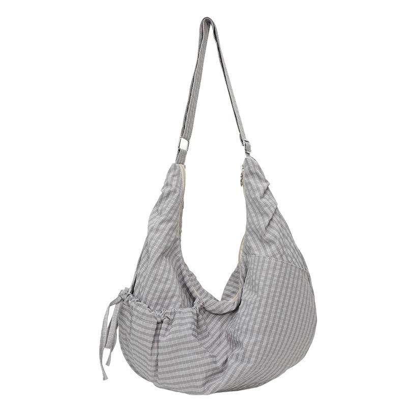 Korean version of fashion plaid shoulder bag 2025 new large-capacity retro commuter messenger bag niche foreign style dumpling bag