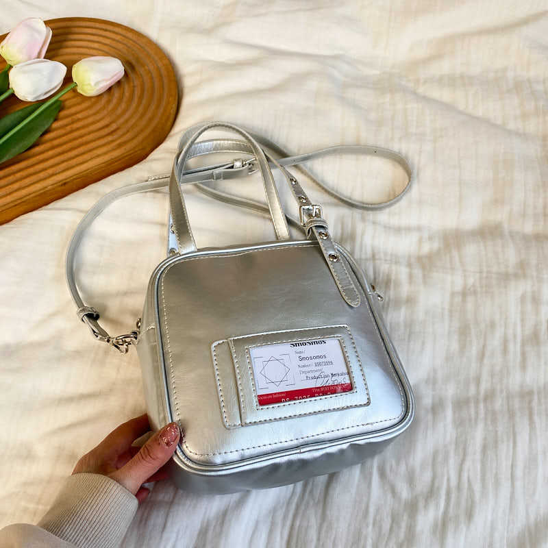 

Premium handbag small bag fashion women s bag 2025 spring new small square bag versatile single shoulder oblique span bag серебряный