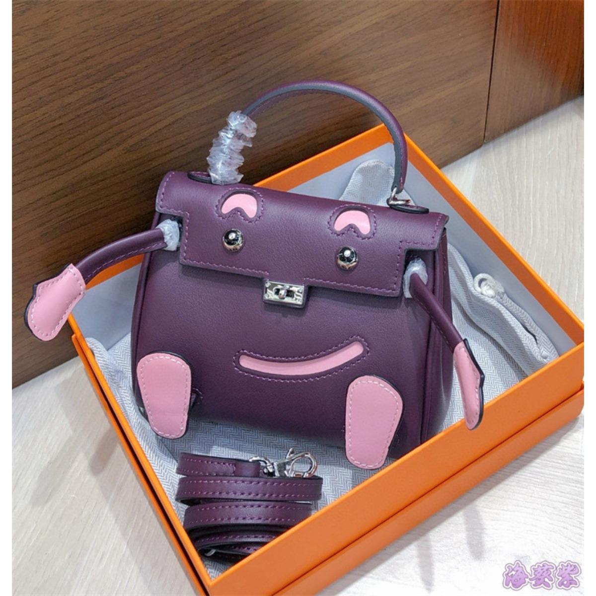 

Smiley bag 2025 new cute mini messenger bag first layer cowhide shoulder handbag spoof Kelli bag woman 16CM