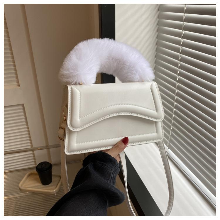 

Модная нишевая дизайнерская сумка женская 2024 ранняя весна новая женская сумка однотонная повседневная сумка одно плечо сумка-мессенджер прилив белый