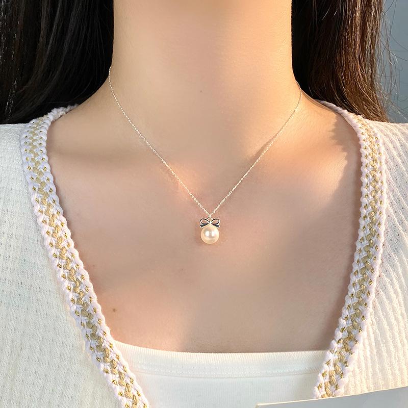 Sweet Butterfly Pearl Necklace for Women's Light Luxury and High Grade Feeling, Girls' Heart Design, and Neckwear