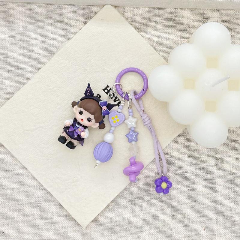 

Hand-Painted Bead Phone Chain with Cute Doll Pendant Keychain
