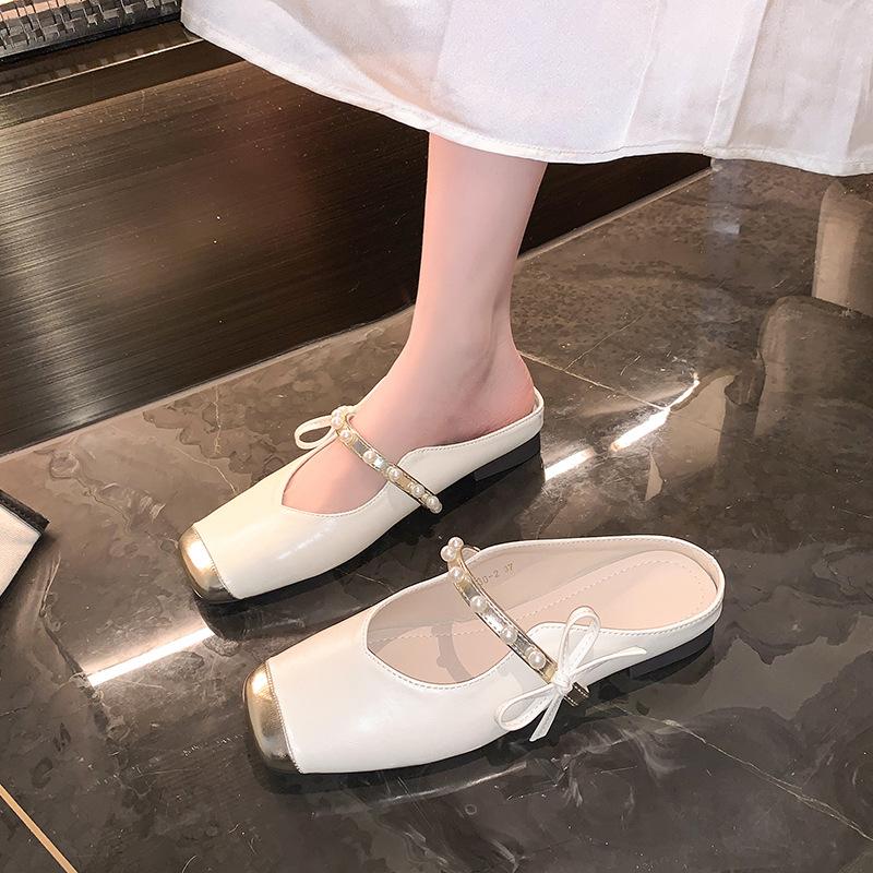 

In the summer of 2024, the new fairy pearl splicing word with sandals temperament lazy fashion bag head half slippers woman 35 абрикосовий