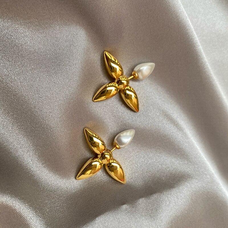 

Металлические серьги с четырьмя листами клевера и жемчугом, легкие роскошные и нишевые аксессуары для ушей