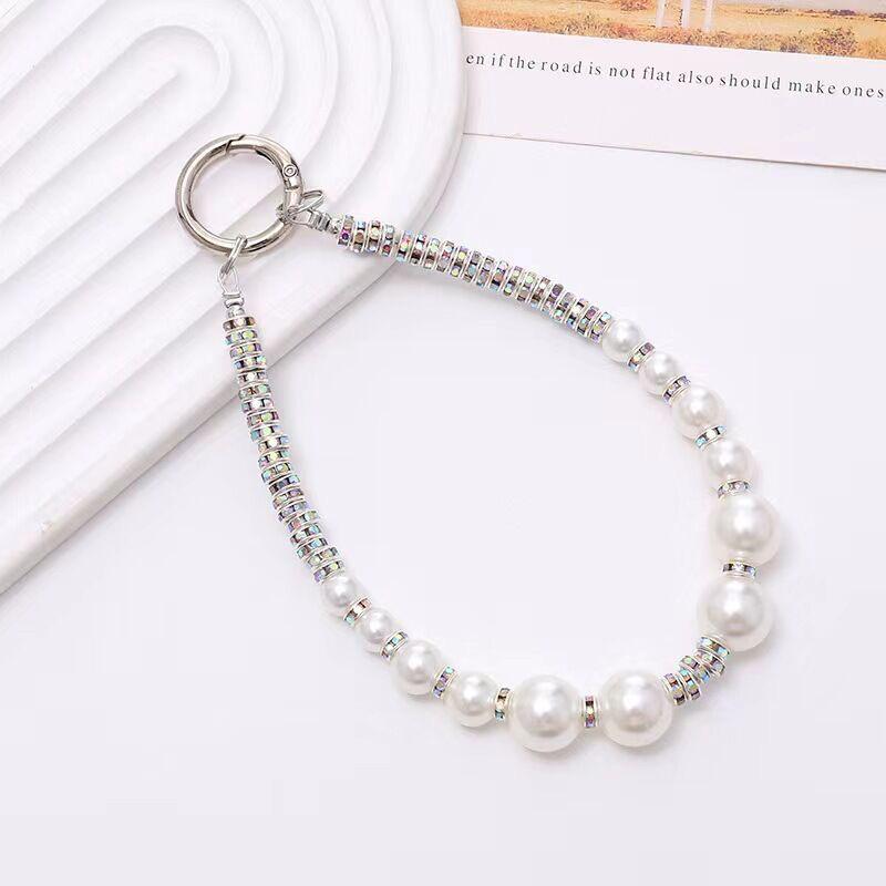 

Luxury Diamond Pearl Phone Lanyard Wrist Chain Pendant iPhone 16 Pro Max