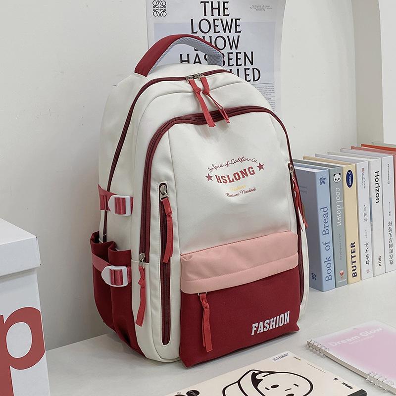 High-value schoolbag female college students contrasting large-capacity backpack junior high school students simple casual computer backpack tide