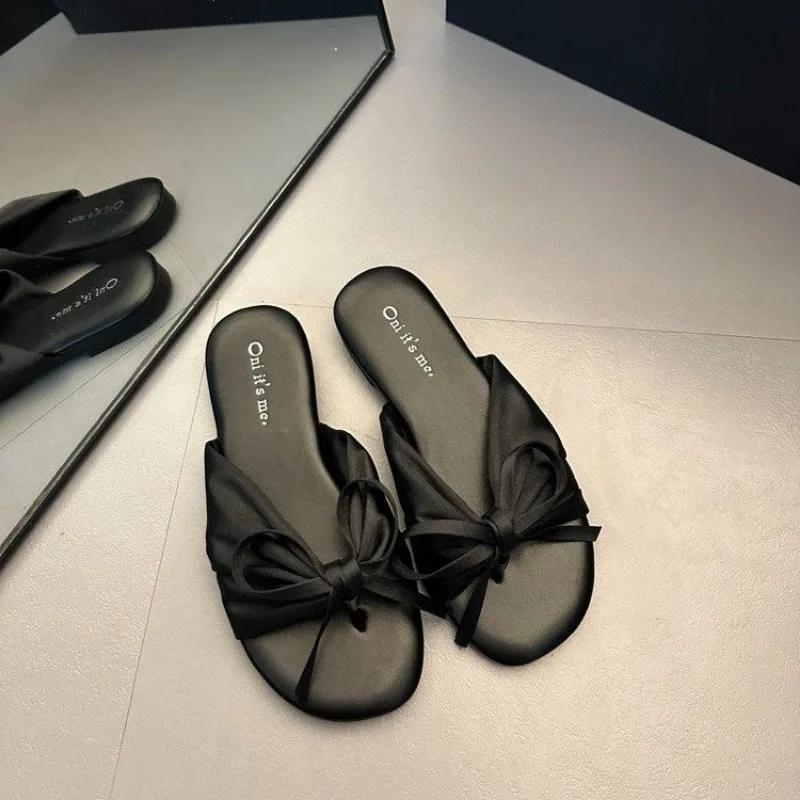 

Летняя новая женская обувь 2024 года, модные женские туфли на плоской подошве, однотонные повседневные тканевые тапочки с бантом 40 чёрный