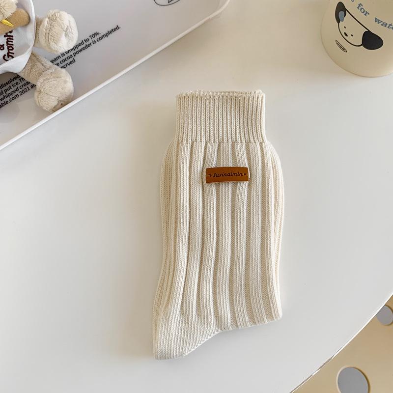 

Spring And Autumn Socks Women S Personality Leather Label Knitted Medium Tube Socks College Style Korean Thick Thread Stacking Socks One size fits all брудно-білий