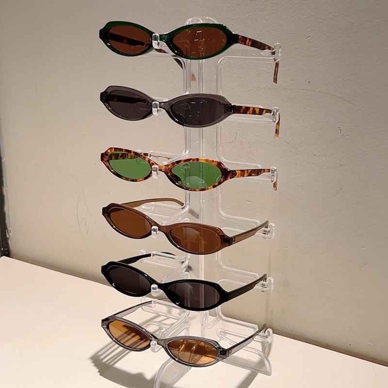 Koreaanse retro bruine ovale zonnebril voor dames, nieuwe kleine montuur modieuze bril, persoonlijkheid Cate Eye outdoor UV400 zonnebril