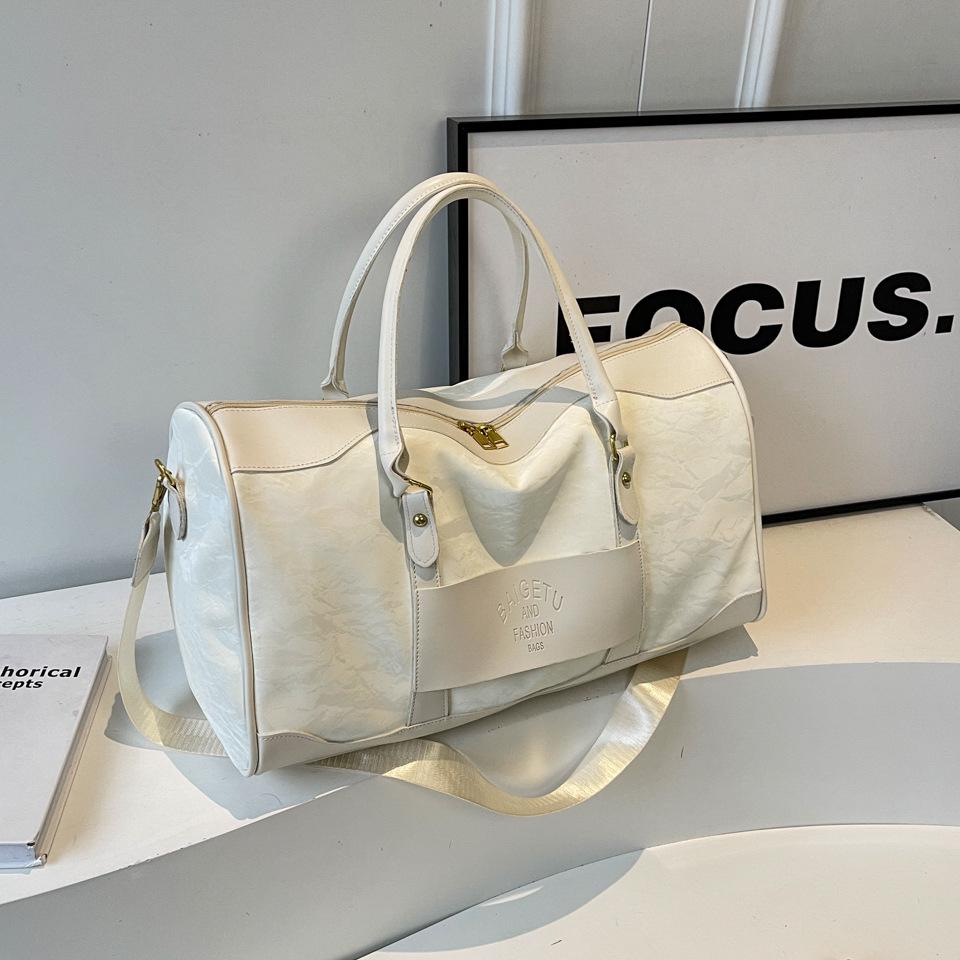 

Женская водонепроницаемая дорожная и спортивная сумка 2025 года для коротких поездок, ручная, рюкзак и наплечная сумка кремовый