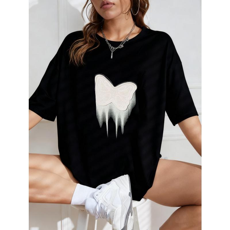 Vit överdimensionerad t-shirt med fjärilsdropptryck för vardagsbruk