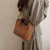 Simple and high-end portable mother and child bag women's summer new large-capacity messenger bucket bag