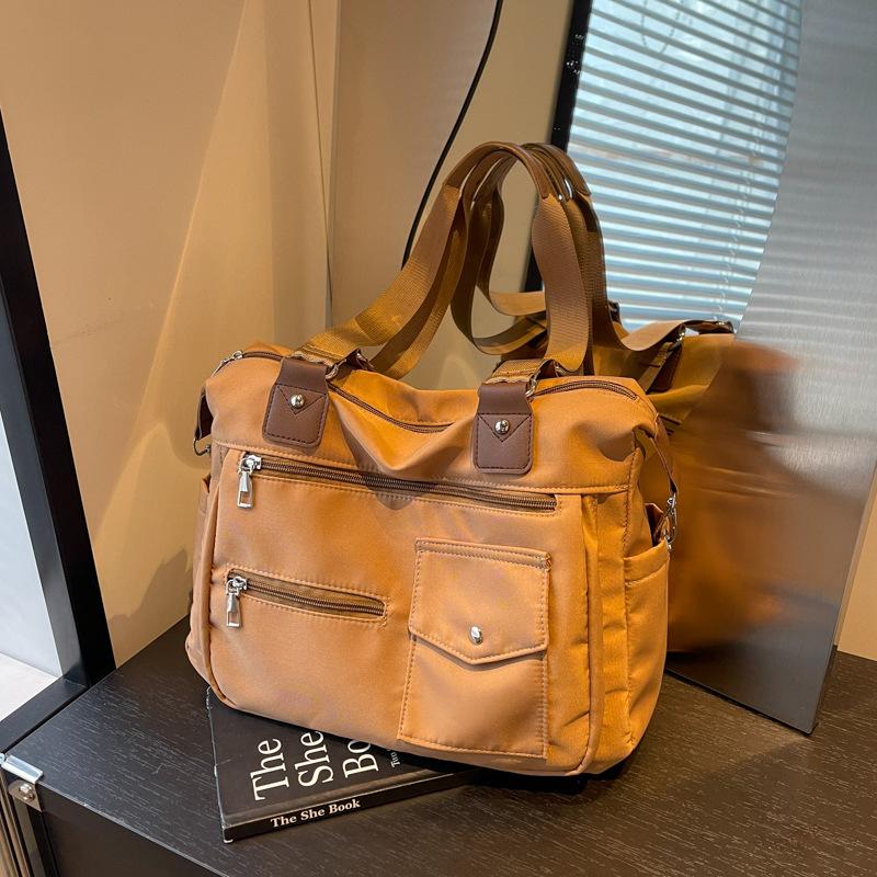 

2024 нова жіноча сумка для поїздок на роботу великої місткості сумка через плече модна велика сумка універсальна коричневий