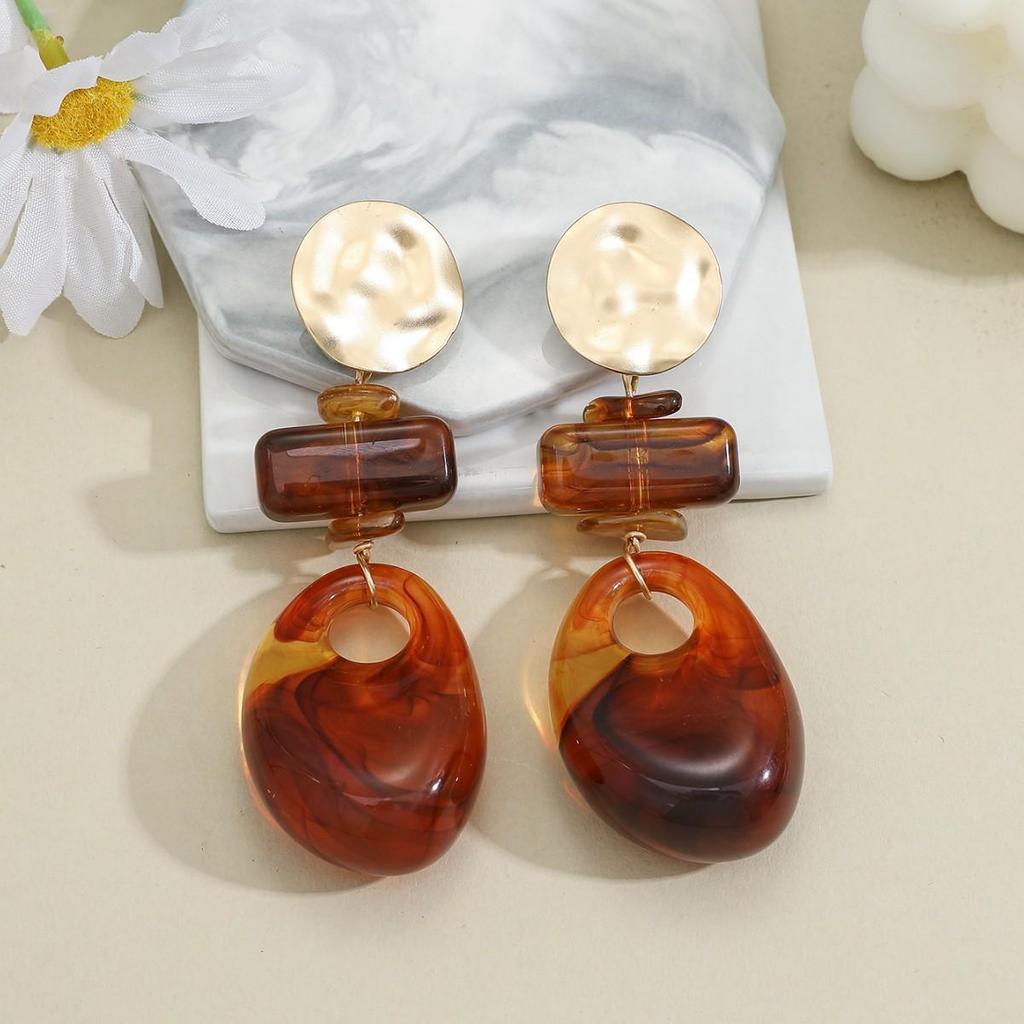 Geometric Hollow Oval Earrings: Smudged, Spliced Stud Design for Women