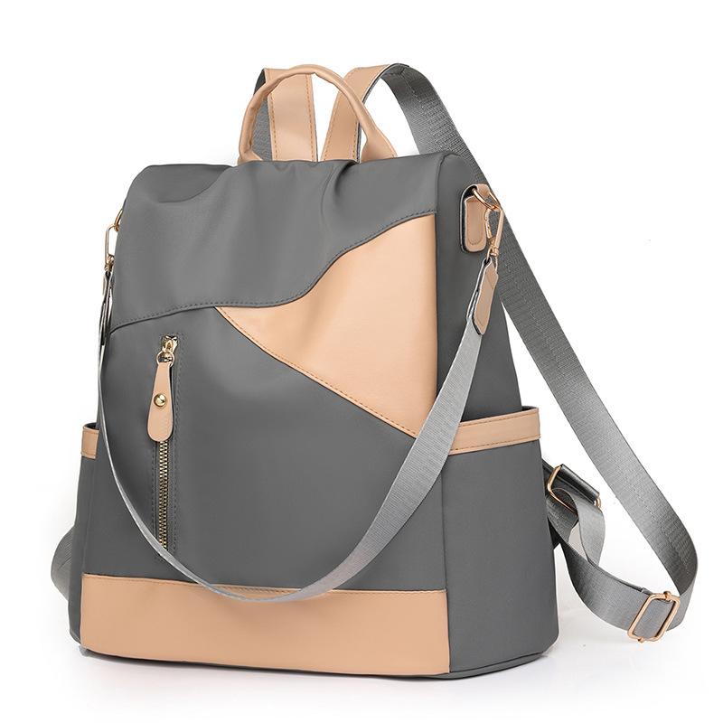 

Splicing backpack women s contrasting soft leather shoulder bag 2025 new student multi-purpose women s backpack