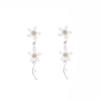 The new light luxury 3D floral fringe women's earrings feature irregular hanging earrings design and unique jewelry accessories