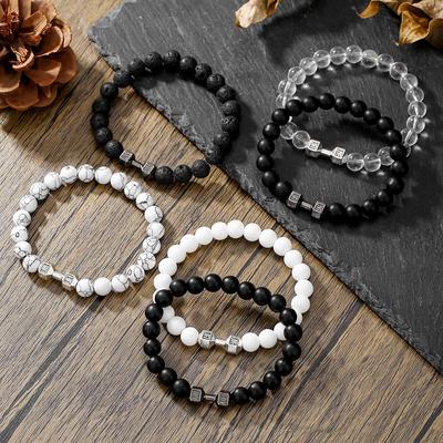 Perlenarmband mit vulkanischem Gestein und weißem Türkis - Naturstein-Schmuck für Paare