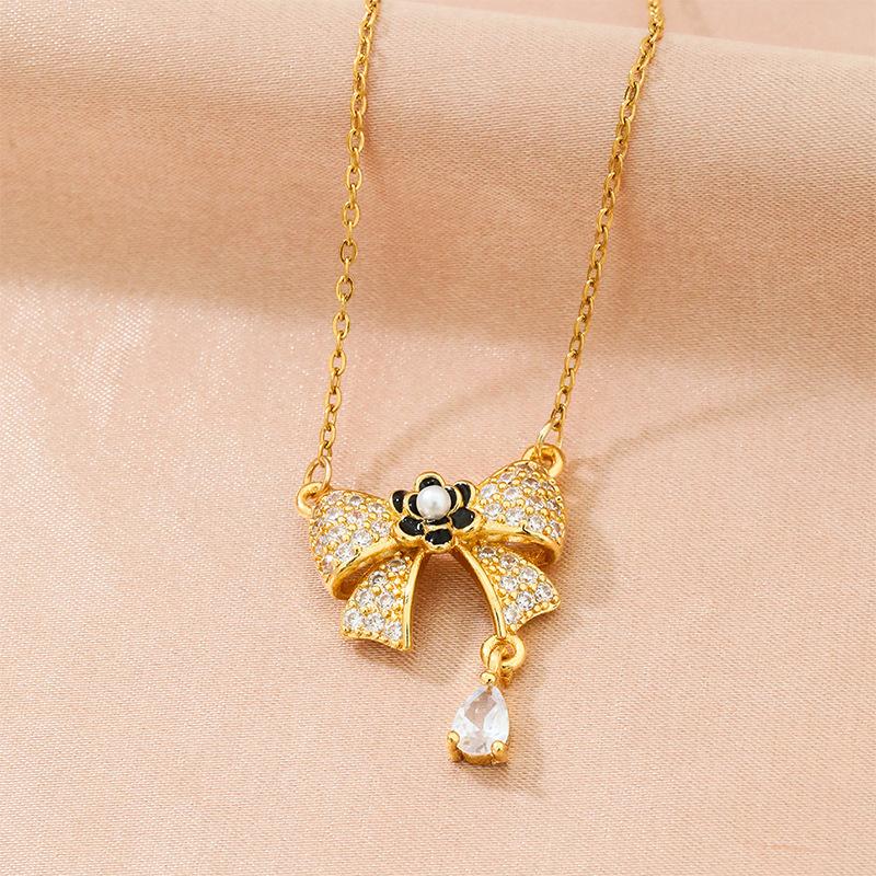 Titanium Steel Light Luxury Bow Necklace Women'S High-End Versatile Temperament Zircon Pendant Same Jewelry