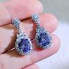 Fashion jewelry: full of diamonds, oval flower studs, exquisite temperament, earrings, light luxury, high-end earrings