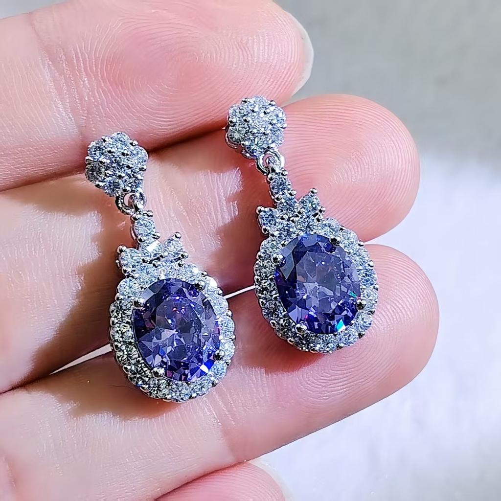 Fashion jewelry: full of diamonds, oval flower studs, exquisite temperament, earrings, light luxury, high-end earrings