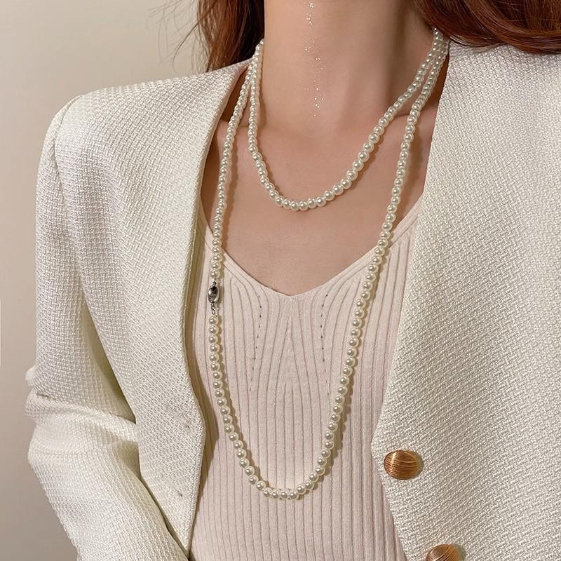

Long pearl necklace women s 2025 new light luxury niche stacked sweater collarbone chain high-end sense beaded jewelry