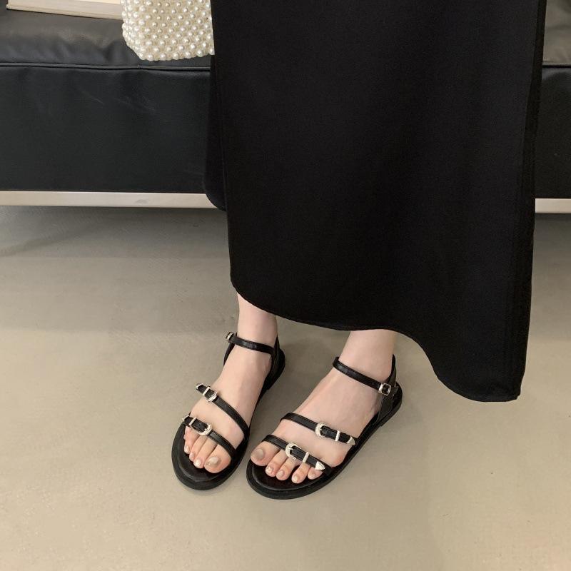 2025 summer new retro one-word buckle with flat sandals women's low-heeled beach shoes open-toed Roman women's shoes