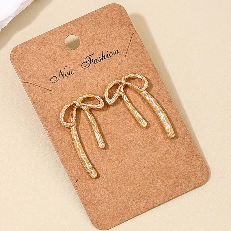 

Fashion Gold Color Bow Stud Earrings For Women 2025 New Trendy Metal Bowknot Ribbon Piercing Earring Zircon Brincos Gifts