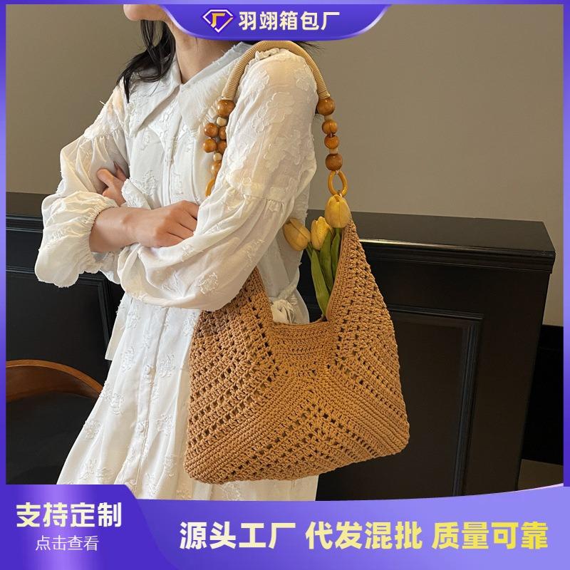 Seaside vacation beach bag women's new summer hollow bag commuting large capacity shoulder tote bag