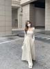 Fake two-piece square-neck long-sleeved dress for women's early spring new beautiful temperament, waist and thin a-word long skirt