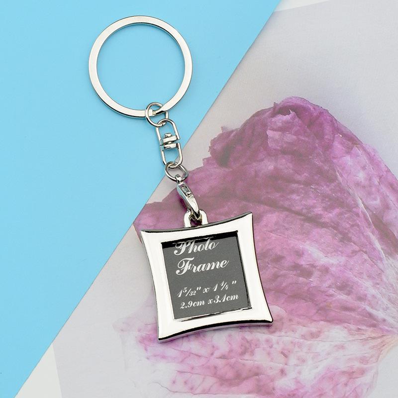 Hjärtformad metallfoto-nyckelring: Perfekt examenspresent