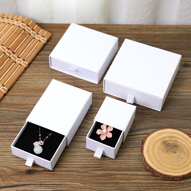 

In-Stock Kraft Paper Jewelry Drawer Box for Rings, Necklaces, and Bracelets - Black Pull-Out Design