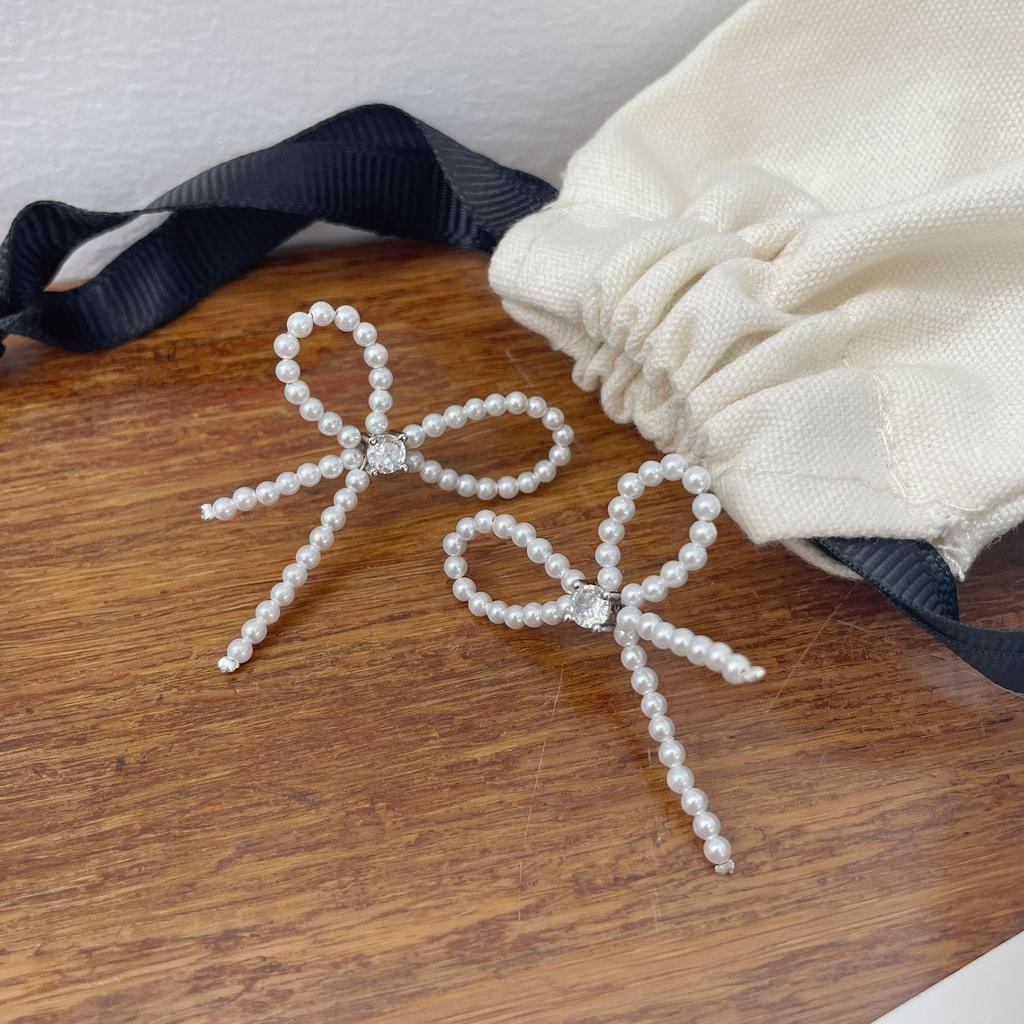 Simple and stylish S925 Temperament bow imitation pearl stud earrings women's zirconium necklace jewelry