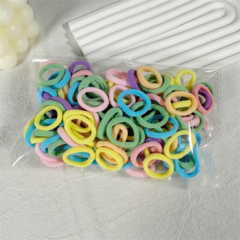 

AWAYTR 100 шт. Эластичные резинки для волос Девочки Мини Цветные Нейлоновые Повязки на Голову Детские Держатели для Хвоста Скранчи Модные Аксессуары для Волос