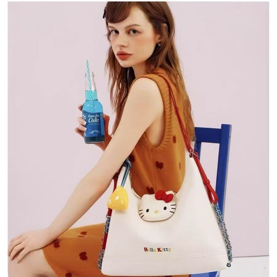 

Nanfeng fashion trend mirror red lake tote bag women s 2025 new Kelly wind oil wax leather shoulder messenger bag кремовый