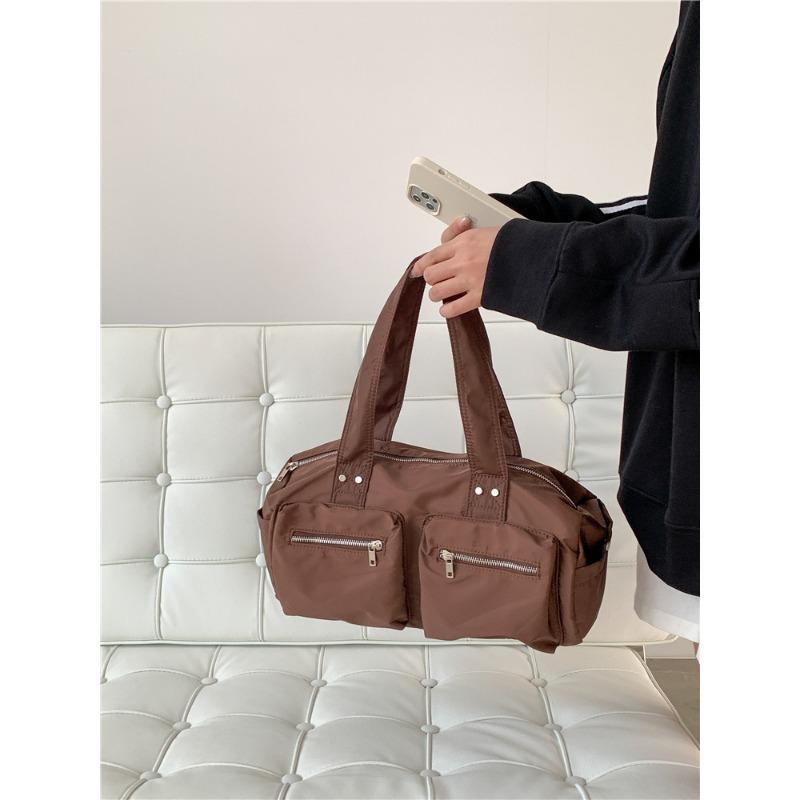 

Новая нейлоновая сумка через плечо для девочек, высококлассная, нишевая, для отдыха, для поездок на работу, женская сумка большой вместимости, цилиндрическая, портативная, женская сумка кофейный