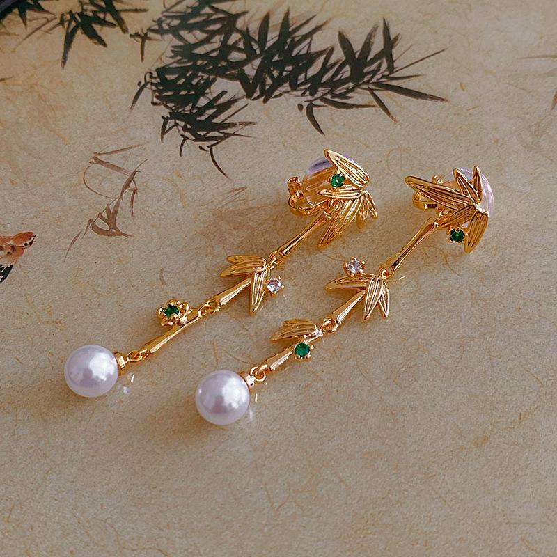 "Silver Needle Bamboo Fan Earrings: Butterfly Drop, Retro Fashion for Women"