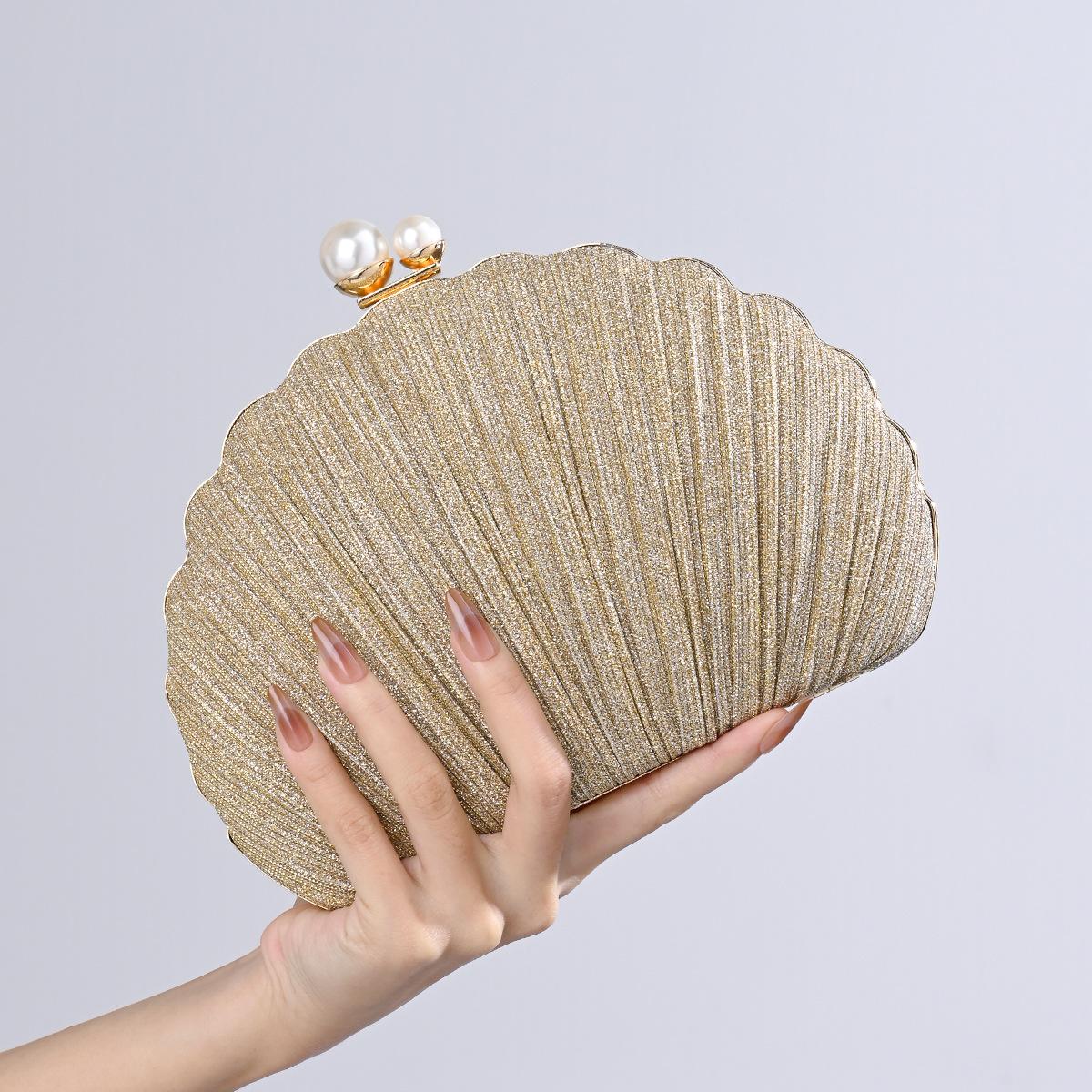 

New light luxury dinner bag, European and American fashion versatile women s pearl handbag, dress bag
