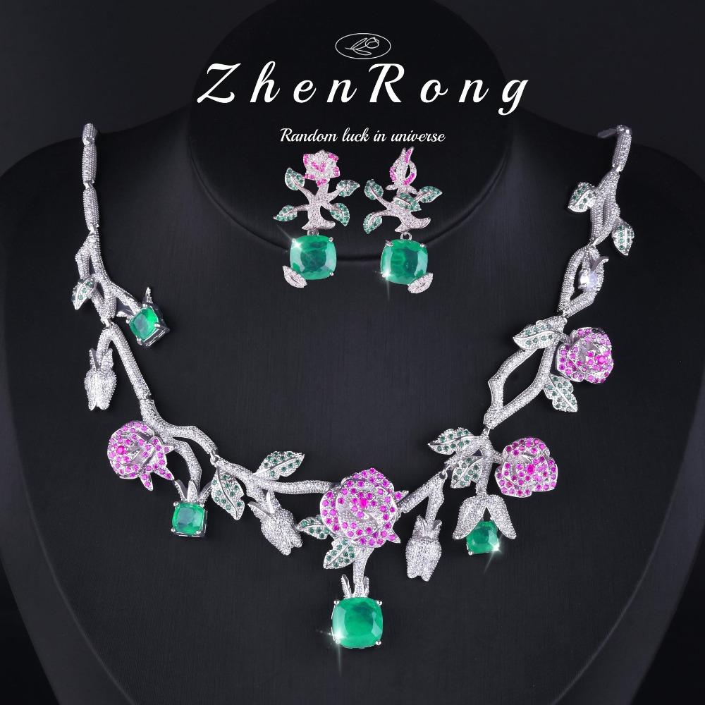 Elegantes Damen-Schmuckset Kamelienblüten-Ohrringe und Halskette mit vollen Diamanten und smaragdgrünem Edelstein