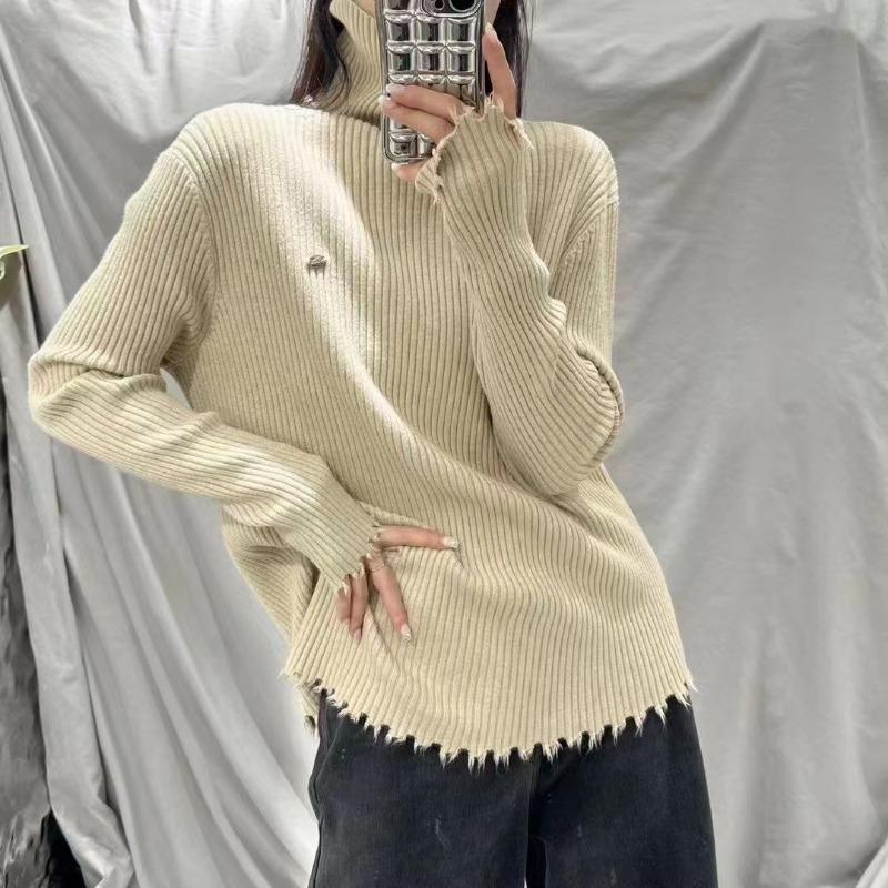 Autumn and winter new simple and versatile knitted bottoming shirt women's design sense solid color turtleneck pullover sweater inner