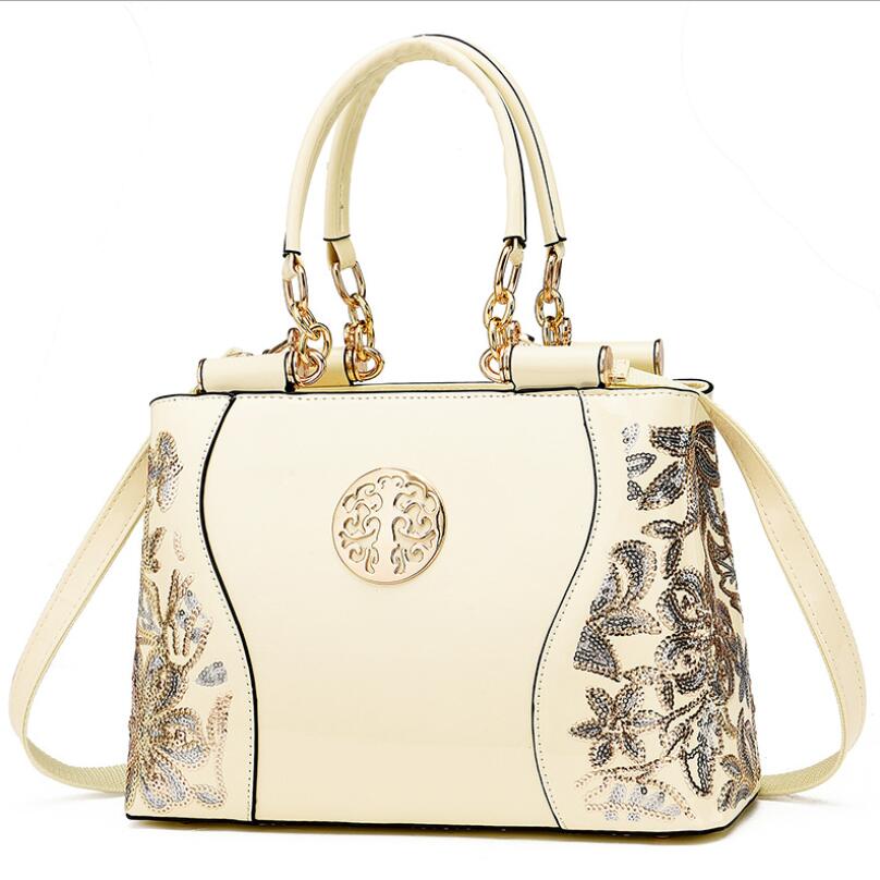 

Европейская американская яркая кожаная женская сумка модная двухсторонняя вышивка женская сумка большой вместимости сумка-тоут сумка-мессенджер