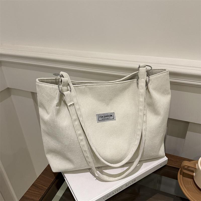 Corduroy bag women's large capacity 2025 new autumn and winter versatile casual shoulder shopping bag commuter tote bag
