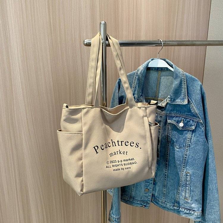 

Canvas bag women s large-capacity new fashion versatile shoulder messenger bag texture autumn and winter commuter tote bag хаки